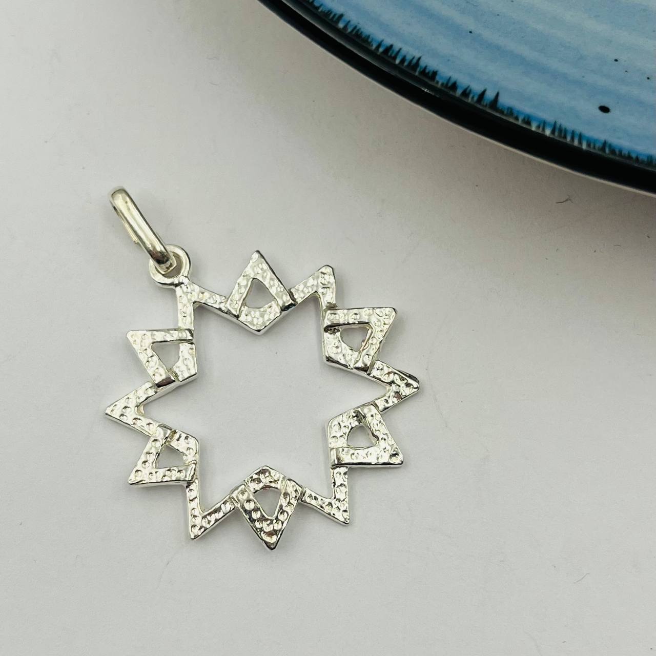 Dije de Estrella 12 Puntas Grande en Plata 925